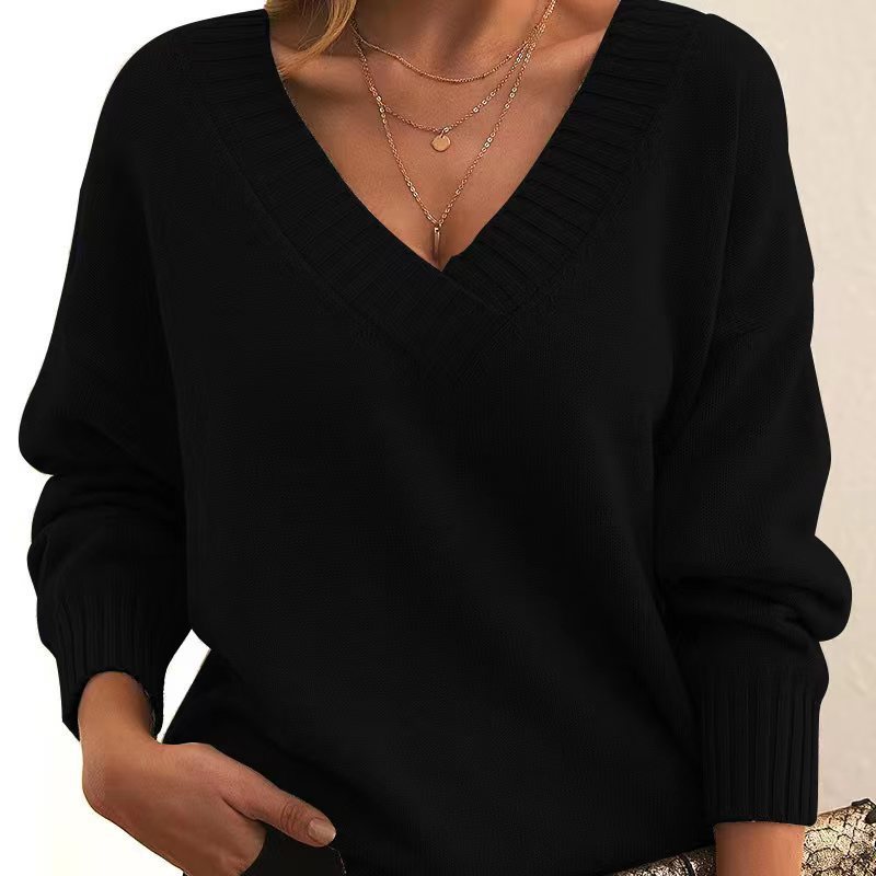 Women's V-Neck Knit Sweater: Solid Color, Relaxed Fit.