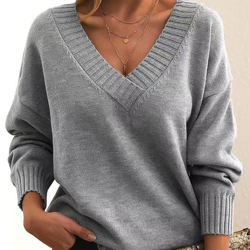 Women's V-Neck Knit Sweater: Solid Color, Relaxed Fit.