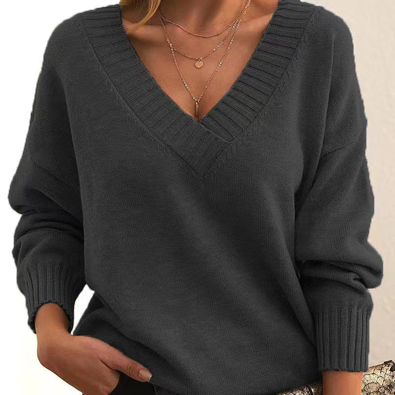 Women's V-Neck Knit Sweater: Solid Color, Relaxed Fit.