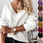 Women's V-Neck Knit Sweater: Solid Color, Relaxed Fit.