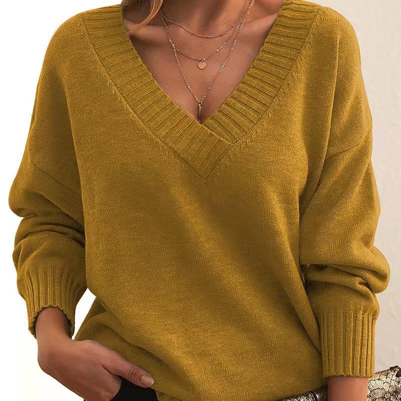 Women's V-Neck Knit Sweater: Solid Color, Relaxed Fit.