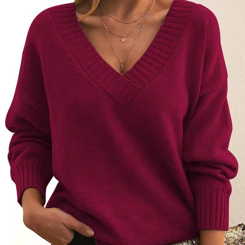 Women's V-Neck Knit Sweater: Solid Color, Relaxed Fit.